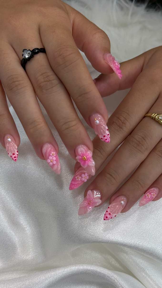 Pink nails with floral art
